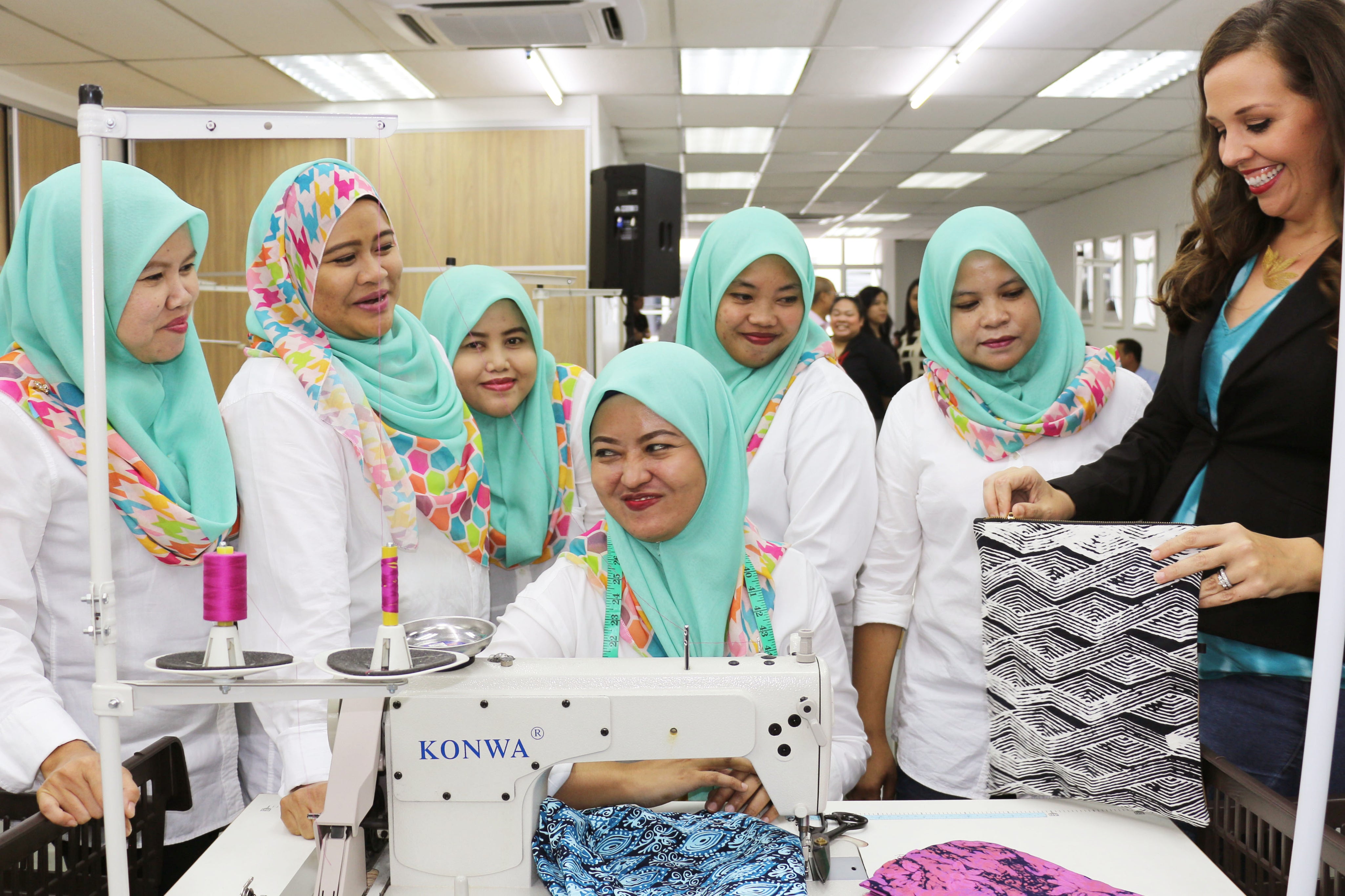 Amy_showing_seamstresses_a_product_2.jpg