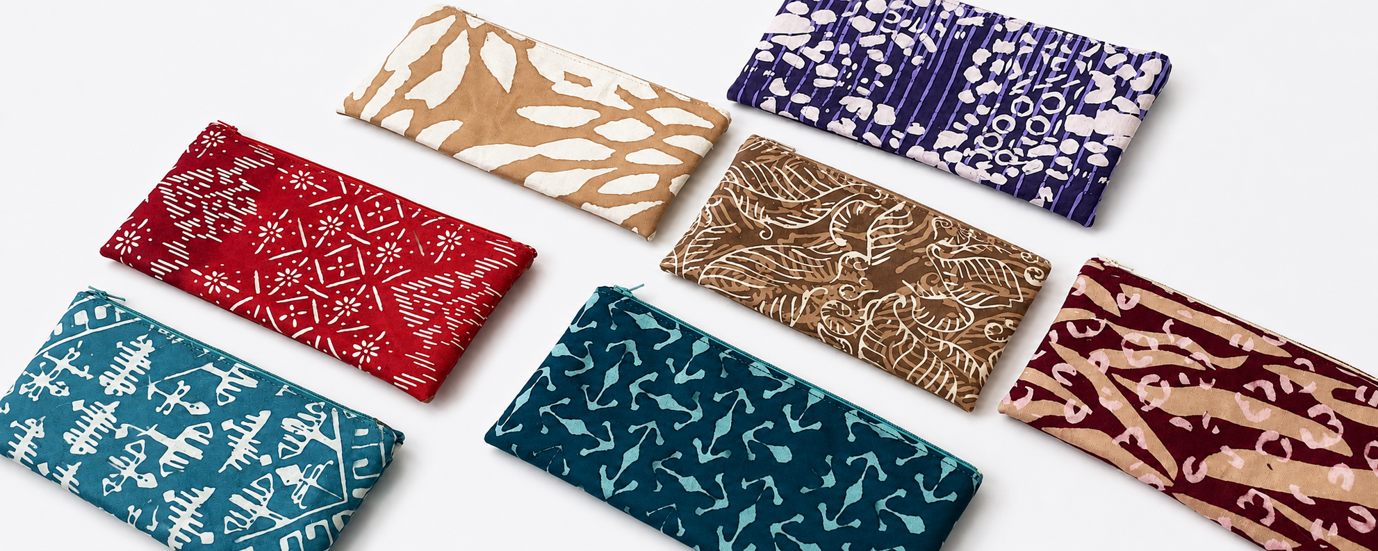 A collection of 430 custom batik zip pouches created for a Fables and Fire client event in Kuala Lumpur.