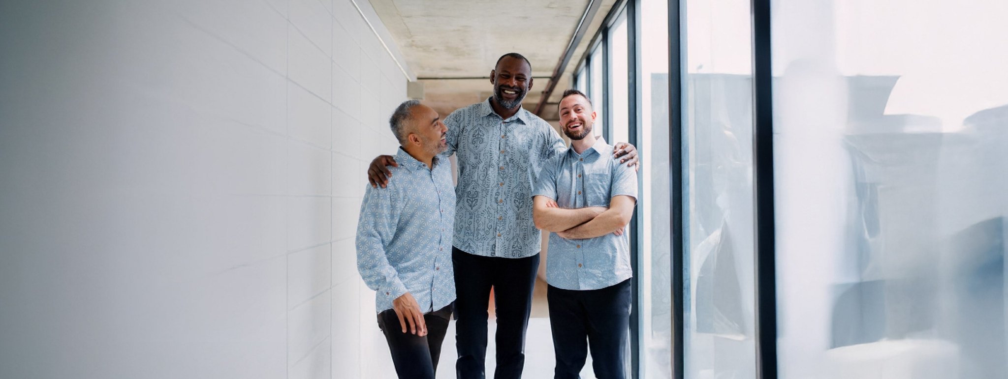 3 men wearing Malaysian batik shirts for formal or office