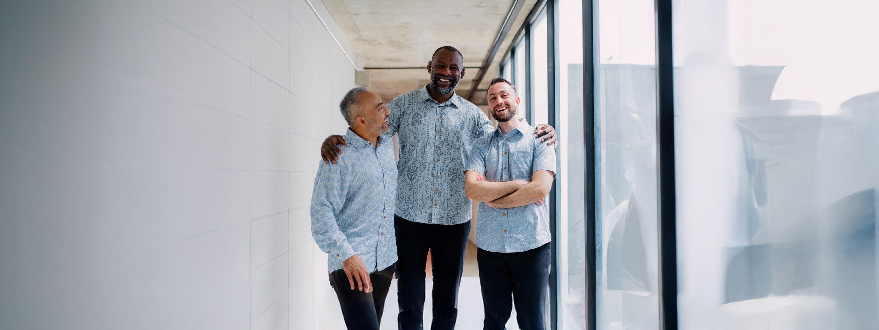 3 men wearing Malaysian batik shirts for formal or office