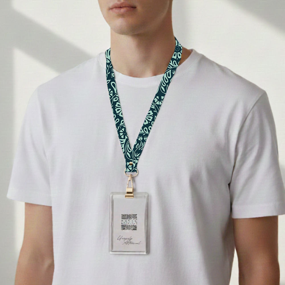 lifestyle photo of a man wearing the Batik Lanyard  in Teal Ukir