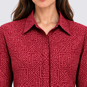 Closeup of girl wearing red batik shirt