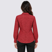 Woman facing back wearing red baitk shirt