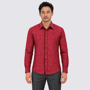 man wearing red batik shirt facing the front
