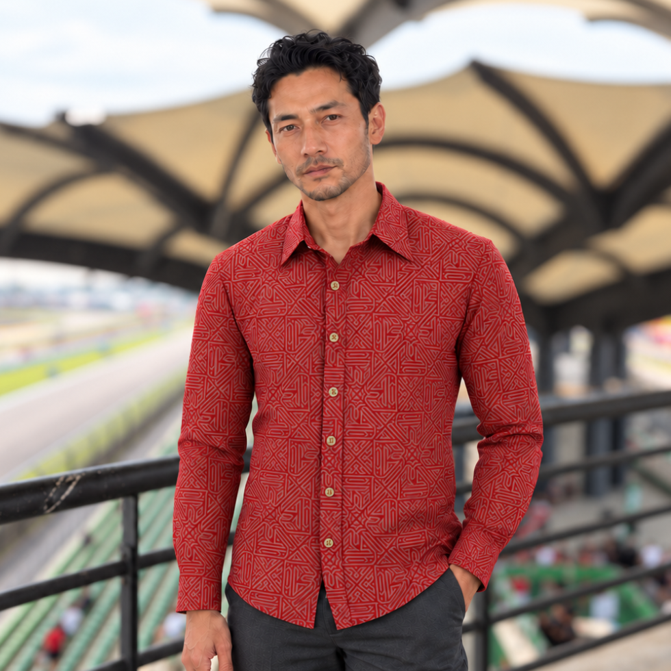 Man wearing red batik shirt at sepang