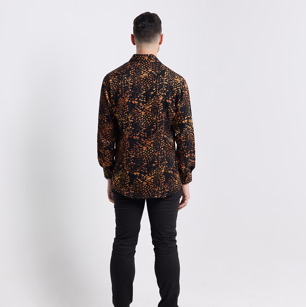 Back view of Batik Boutique’s Black Leopard Silk Batik Shirt with slim fit darts and natural drape, crafted from premium breathable silk
