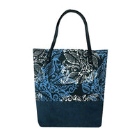 a whitebox photo of batik tote bag in blue nautical fern facing back side of the bag