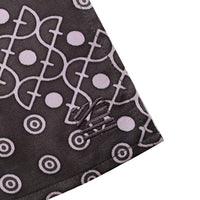 a closeup photo of pocket square of batik boutique logo embroidered