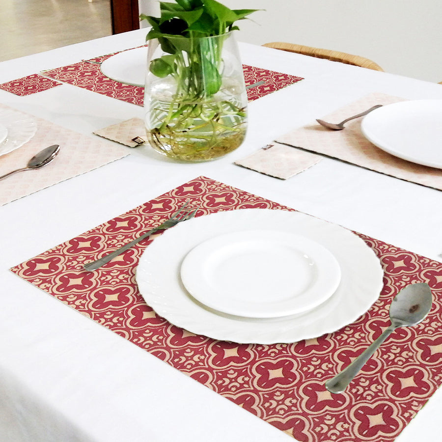 a lifestyle photo of batik homeware in crimson celestial with setting on dining table