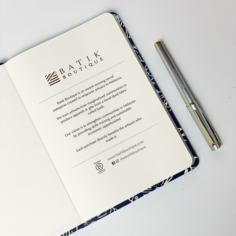 close up of the Navy hibiscus inspired notebook 