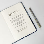 close up of the Navy hibiscus inspired notebook 