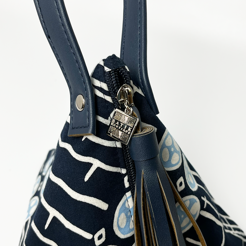 closeup of navy ketupat bag