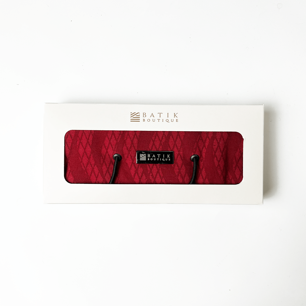 Elegant red snakeskin Batik Travel Roll Up Pouch, perfect for storing travel essentials, handcrafted with love.