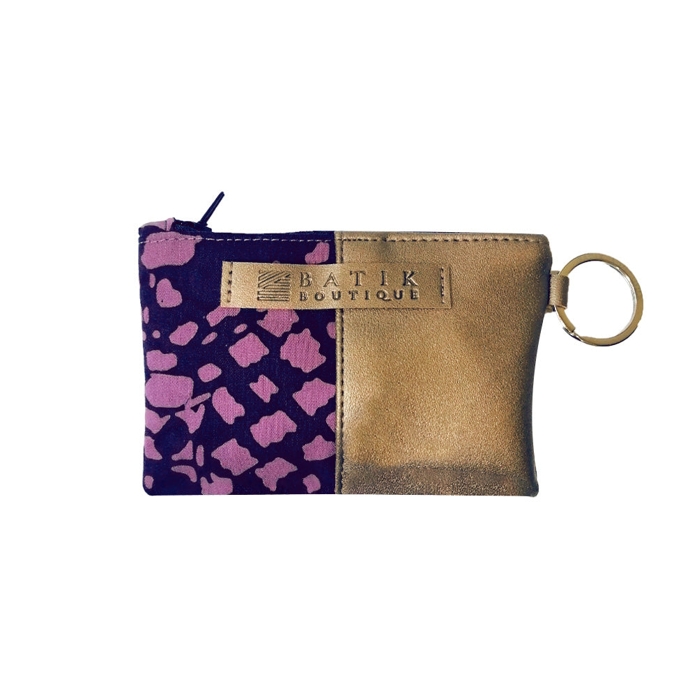 a front whitebox photo of a card holder wallet in the pattern purple bintik in front of a neutral background