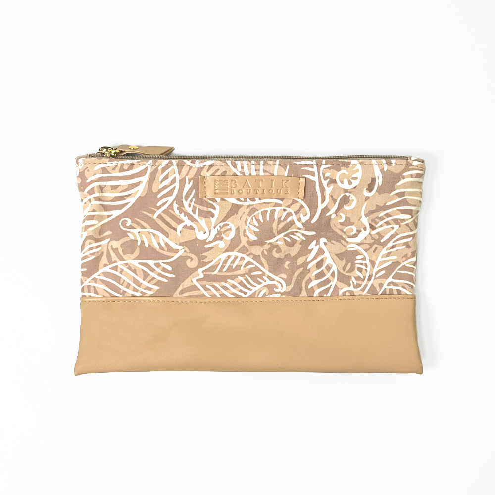 a zip pouch in the pattern tan nautical fern against a white background