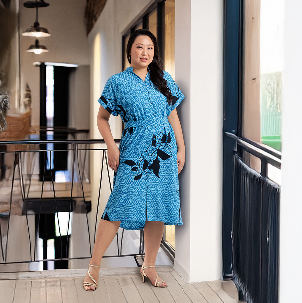 Women wearing the azure blooming lace ayaz dress in a lifestyle image 