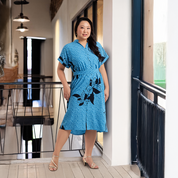 Women wearing the azure blooming lace ayaz dress in a lifestyle image 