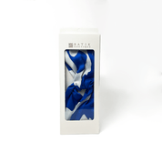 Blue and white scarf in a 'Batik Boutique' box on a white background
