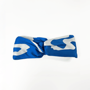Blue and white headband with a pattern on a white background