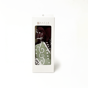 Packaged batik fabric with visible brand name on a white background