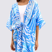 Blue and white patterned kimono-style garment on a plain background