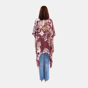 Woman facing the back wearing maroon kimono