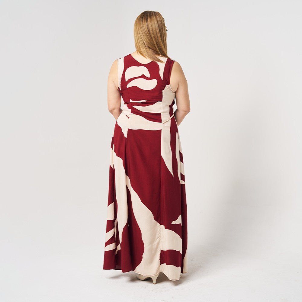 Batik Maxi Dress Crimson Rose back angle of the model 
