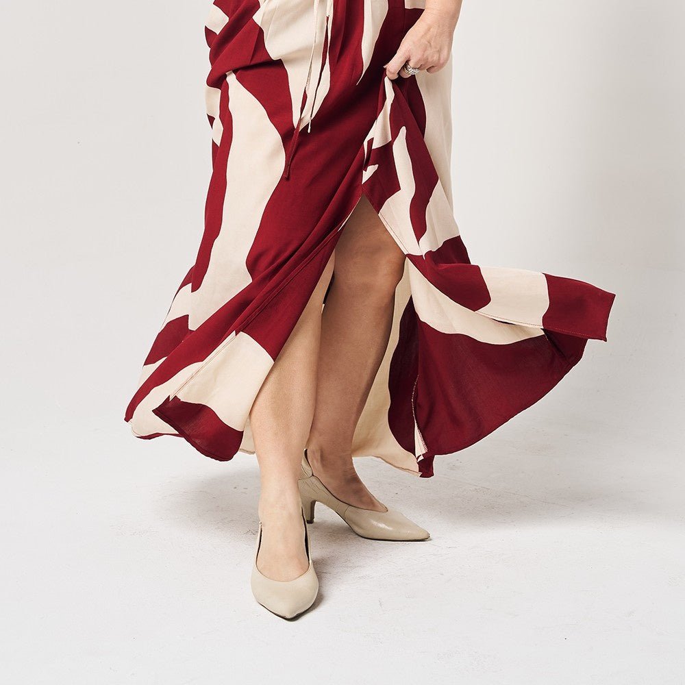 Batik Maxi Dress Crimson Rose  close up of the bottom of the dress 