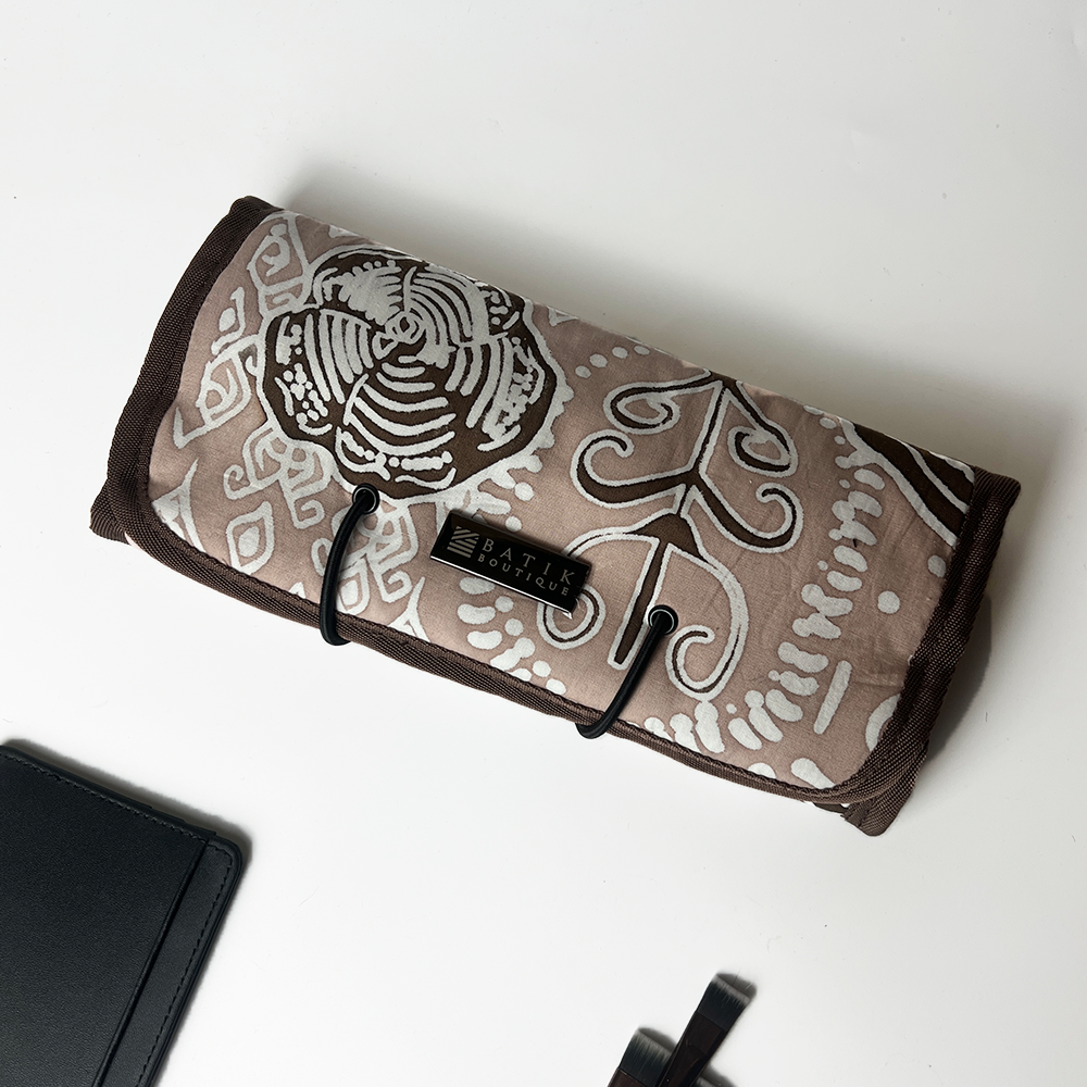 Roll-up mat with patterned design on a white surface