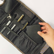 Teal ukir Travel pouch  showcasing pockets 