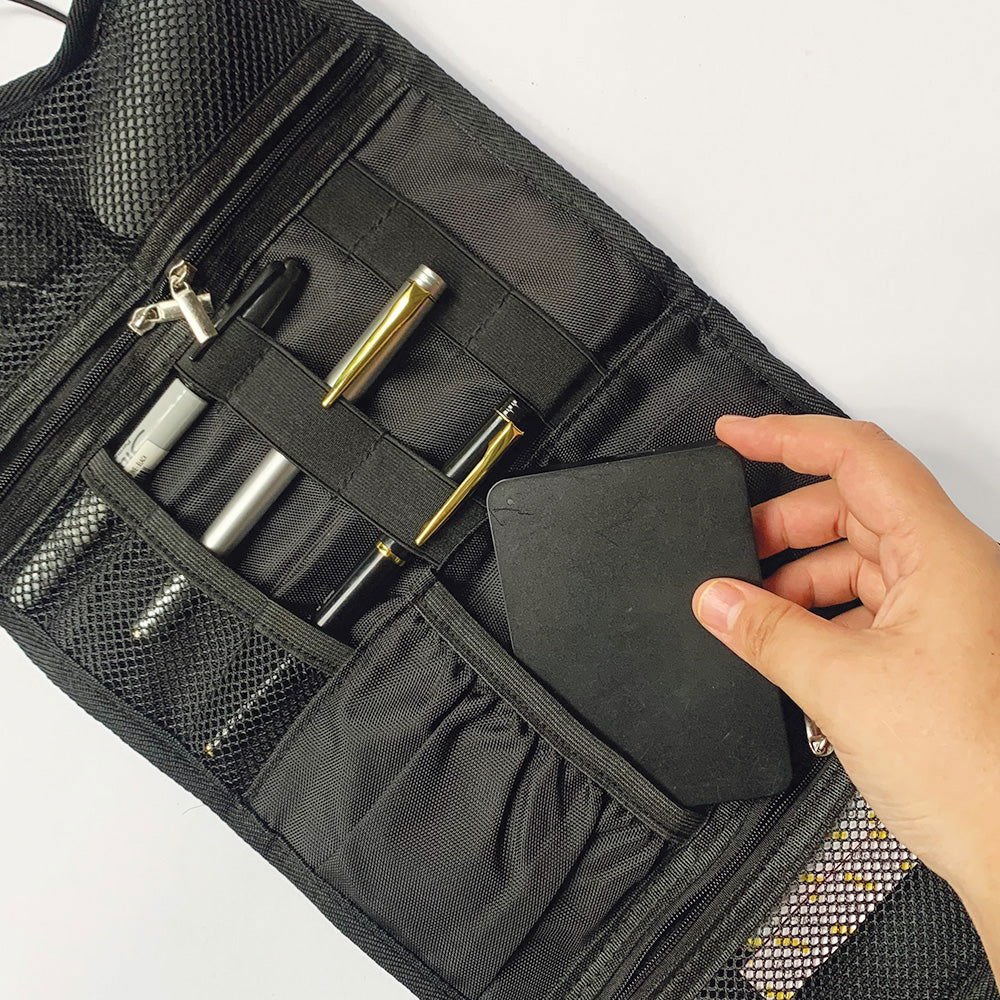 Batik Roll-Up Travel Pouch in  Black Floret showing the available storage 