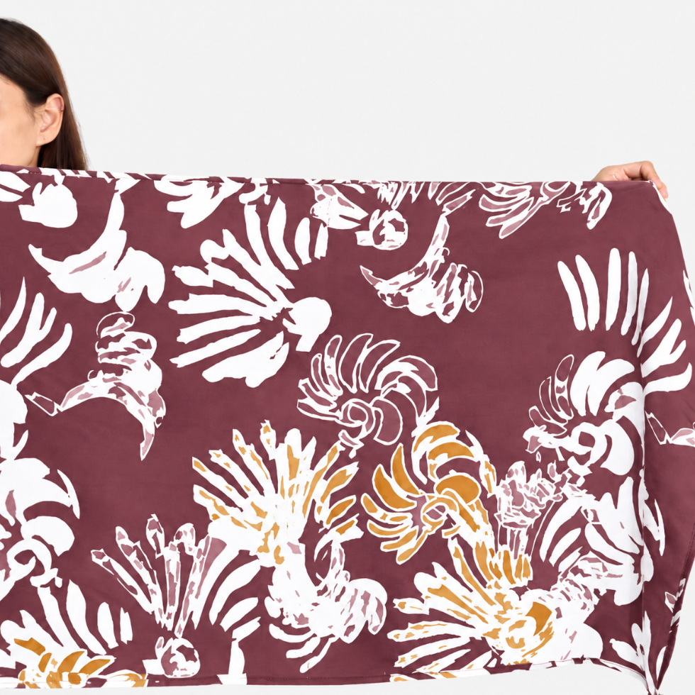 Closeup of maroon printed batik scarf