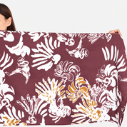 Closeup of maroon printed batik scarf