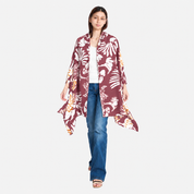 Woman wearing maroon printed batik scarf facing front