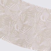 Close up of the grey printed batik scarf, showing the print and details