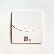 White box with a QR code and logo on a white background