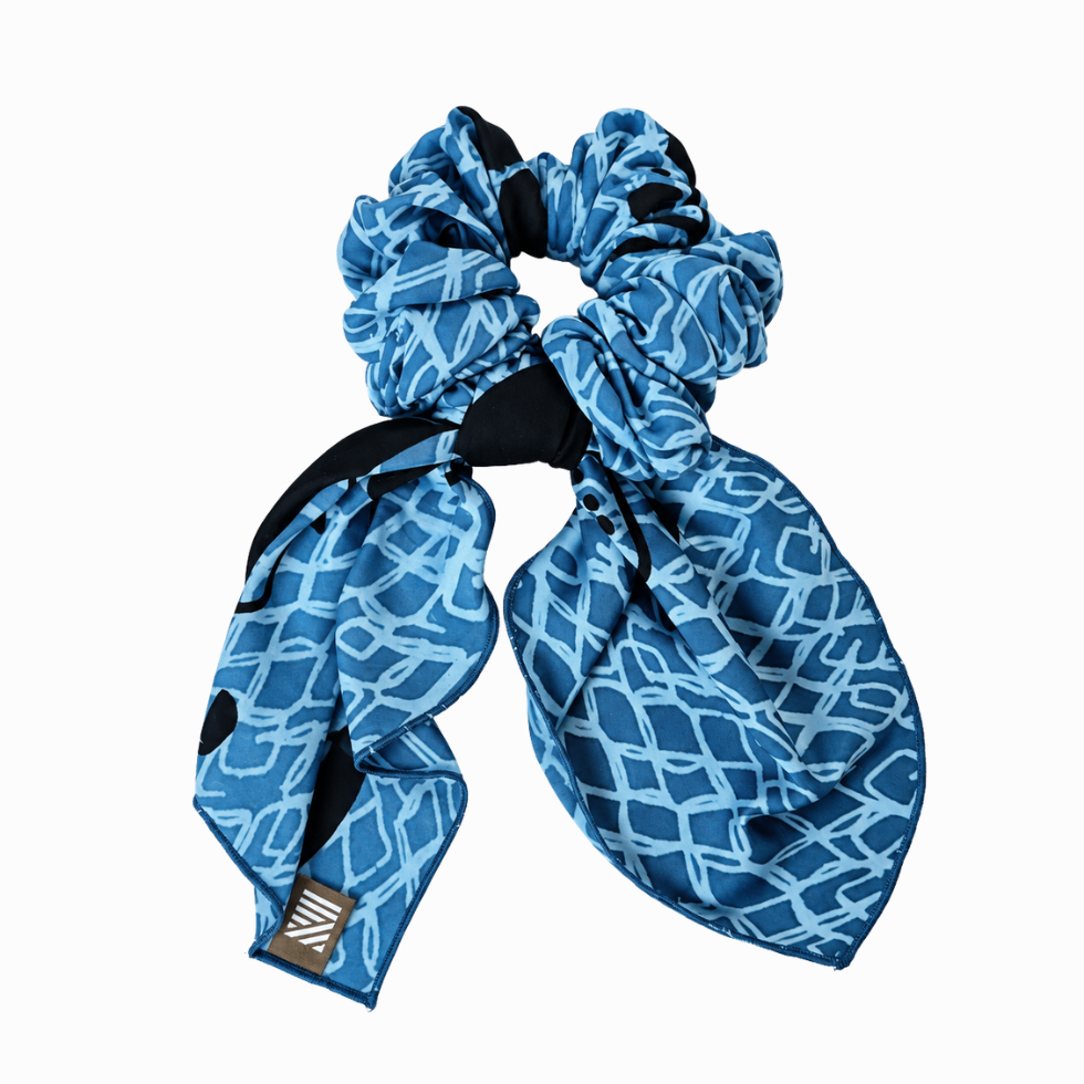 Flatlay of blue printed batik scarf