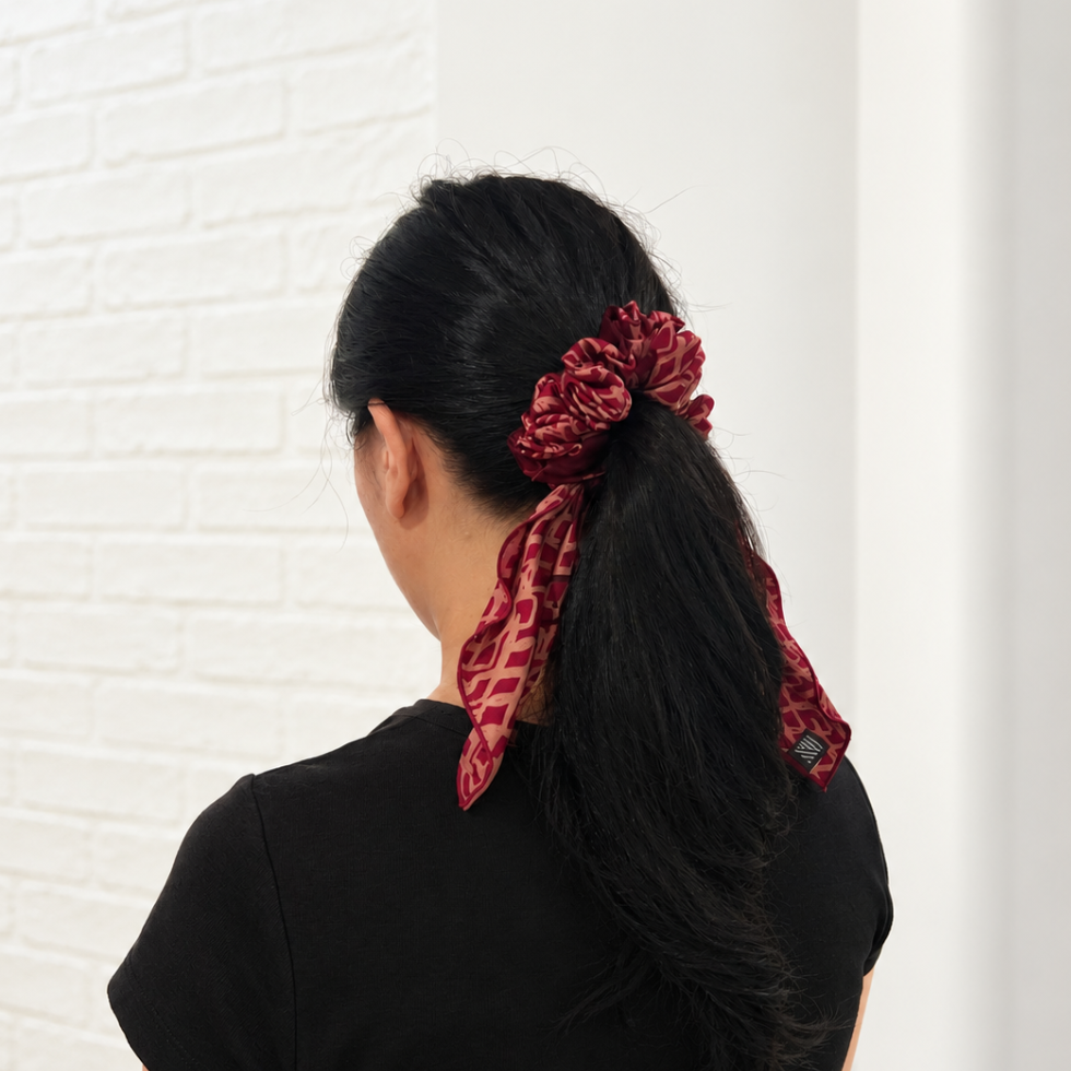 Lady wearing Red/Copper Batik Scrunchy