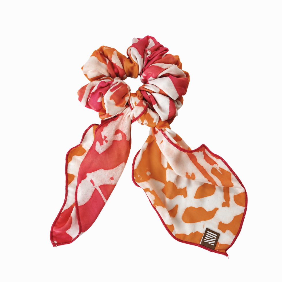Flatlay of Orange and Pink Batik Scrunchy