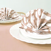 Batik Serviette Set Tan Bunga show on a plate 