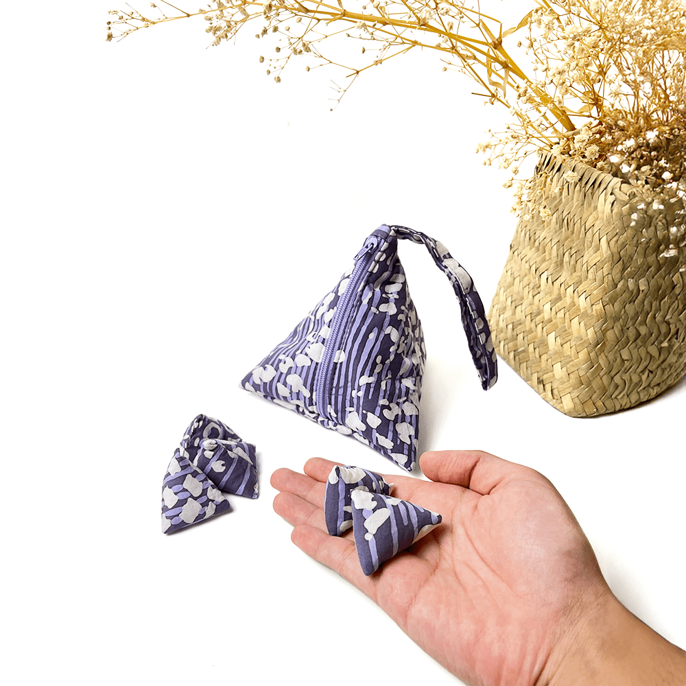 a photo of batu seremban with authentic batik in the pattern lavender bintik