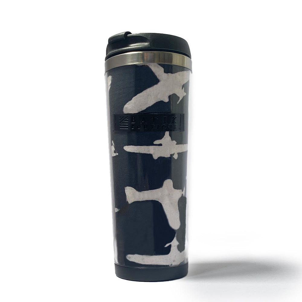 a whitebox photo of a tumbler made of batik in black airplane pattern