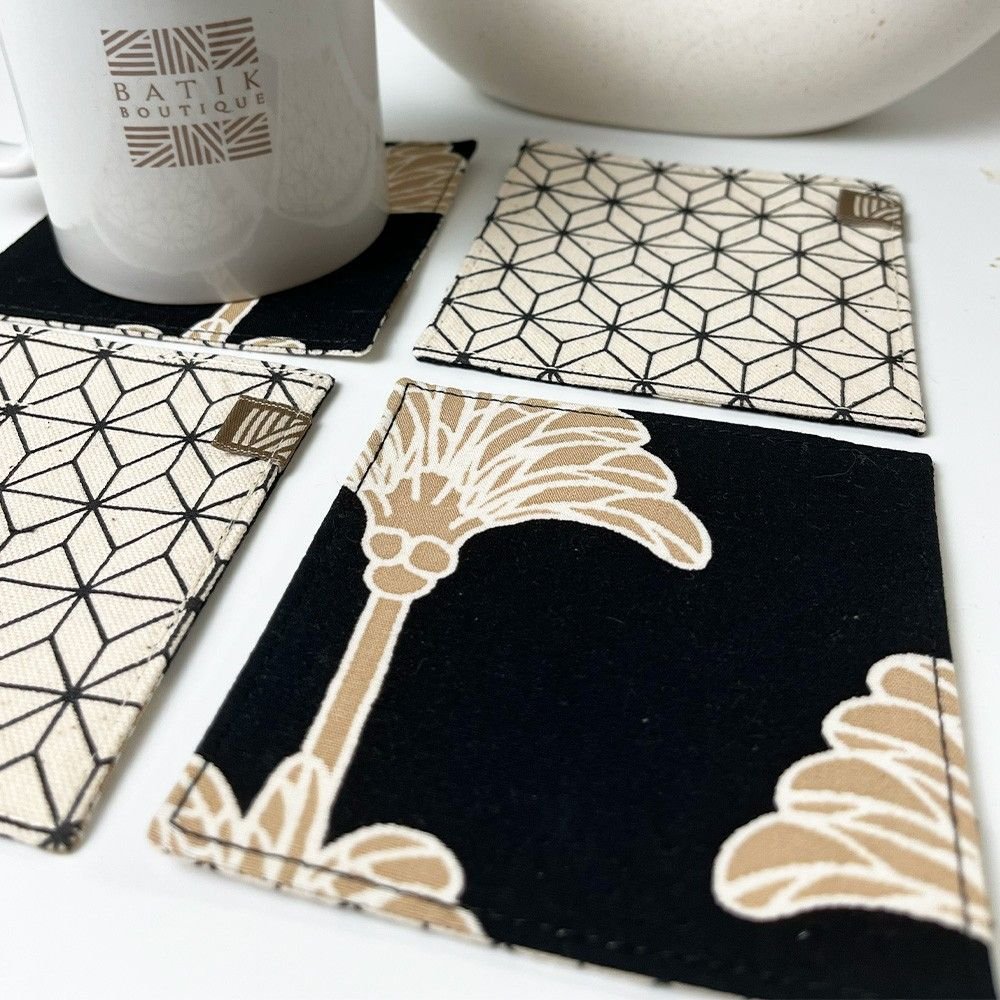 close up view of Black coconut coasters 