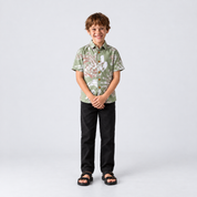 Kid smiling wearing green shirt