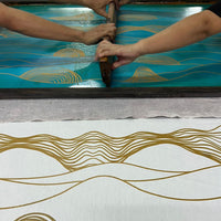 artisans is doing batik in silkscreen technique
