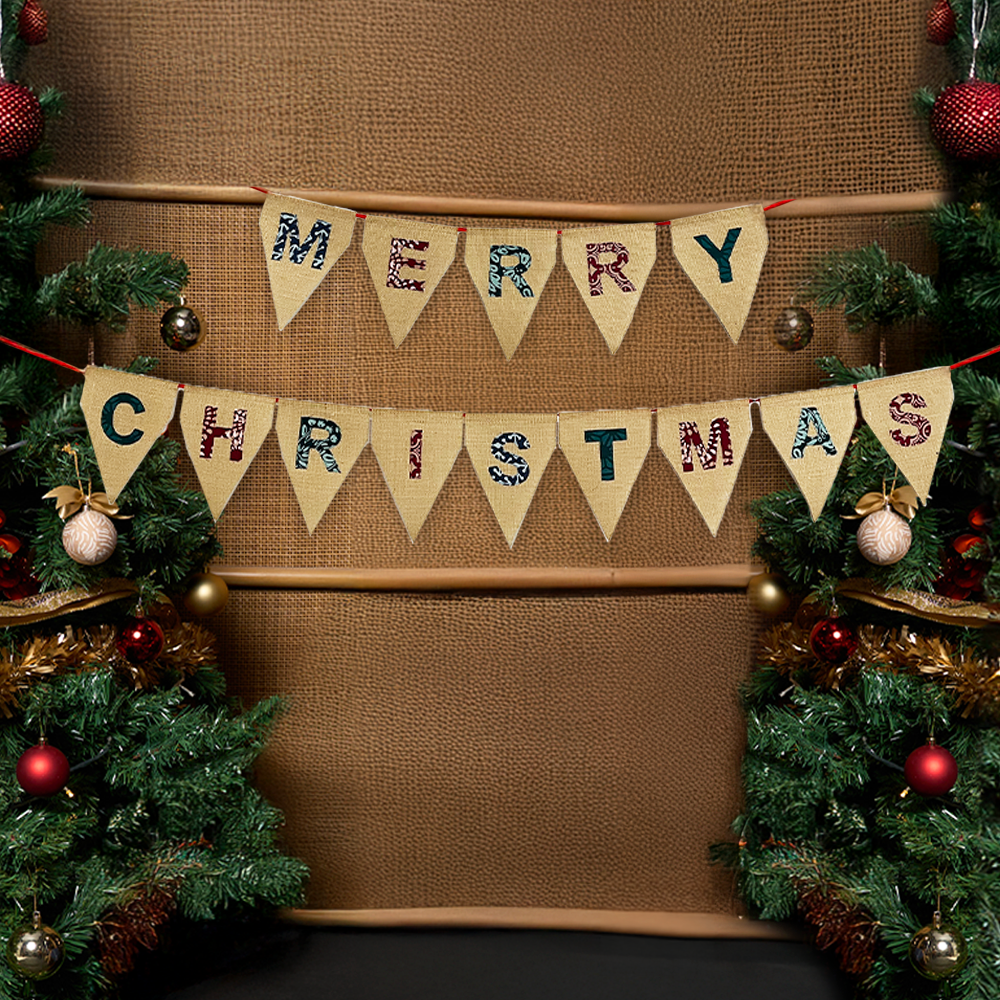 bunting merry christmas in a lifestyle photo with christmas tree and rattan screen