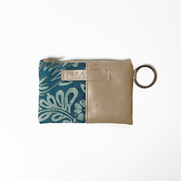 a white box photo card holder wallet in the pattern teal ukir