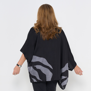 the back view of batik kimono in the pattern grey rose against a white background