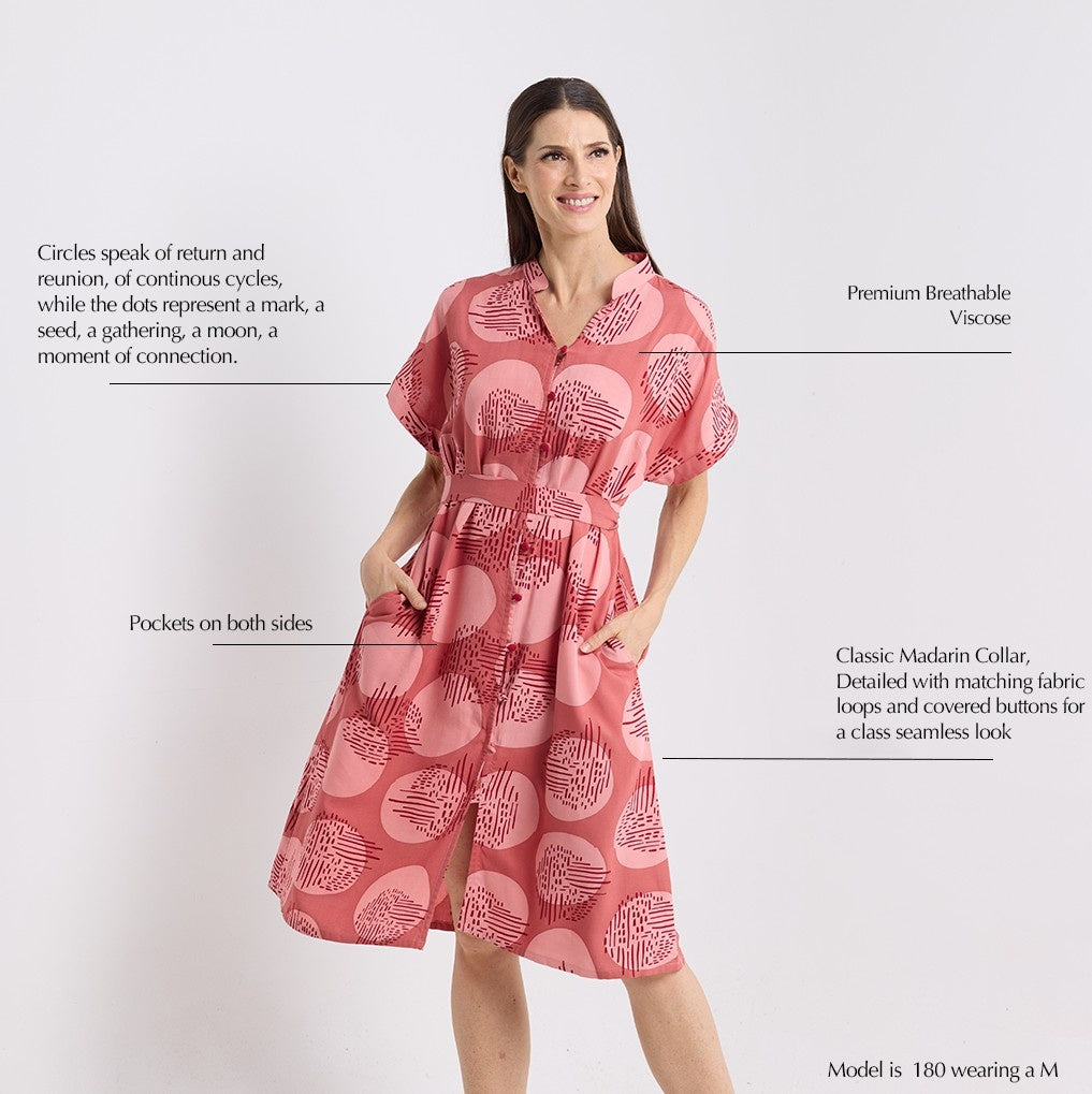 Women's wearing the crimson ayaz dress in photo that is showing the dress unique product assets 