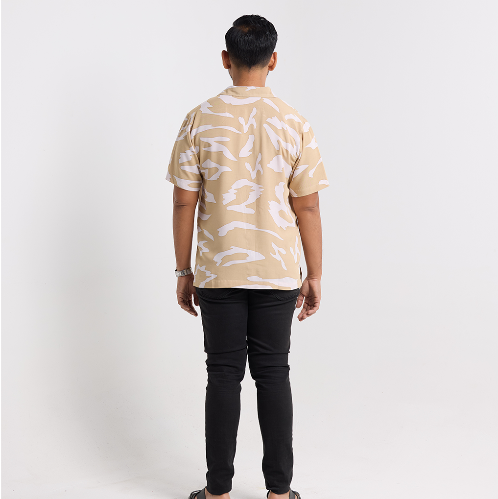 back view of the tan rimba cuban shirt 